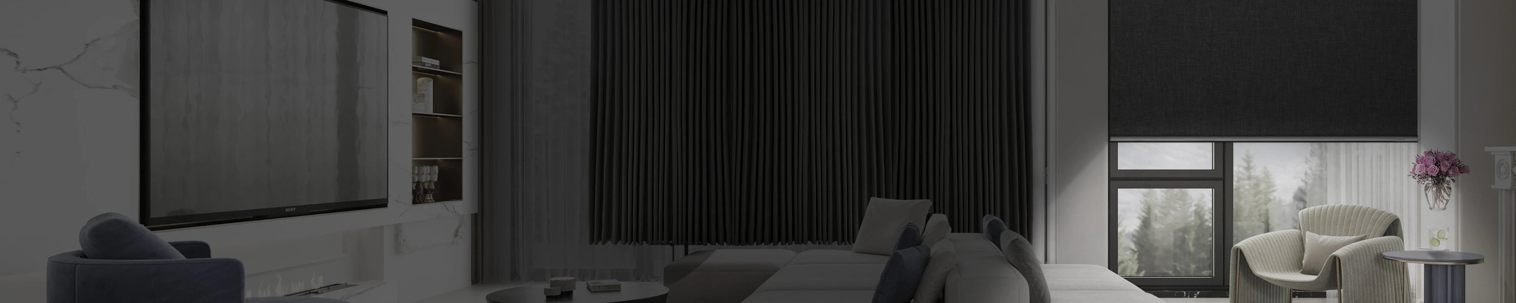 Modern living room with a large TV, sofa, and blackout shades.