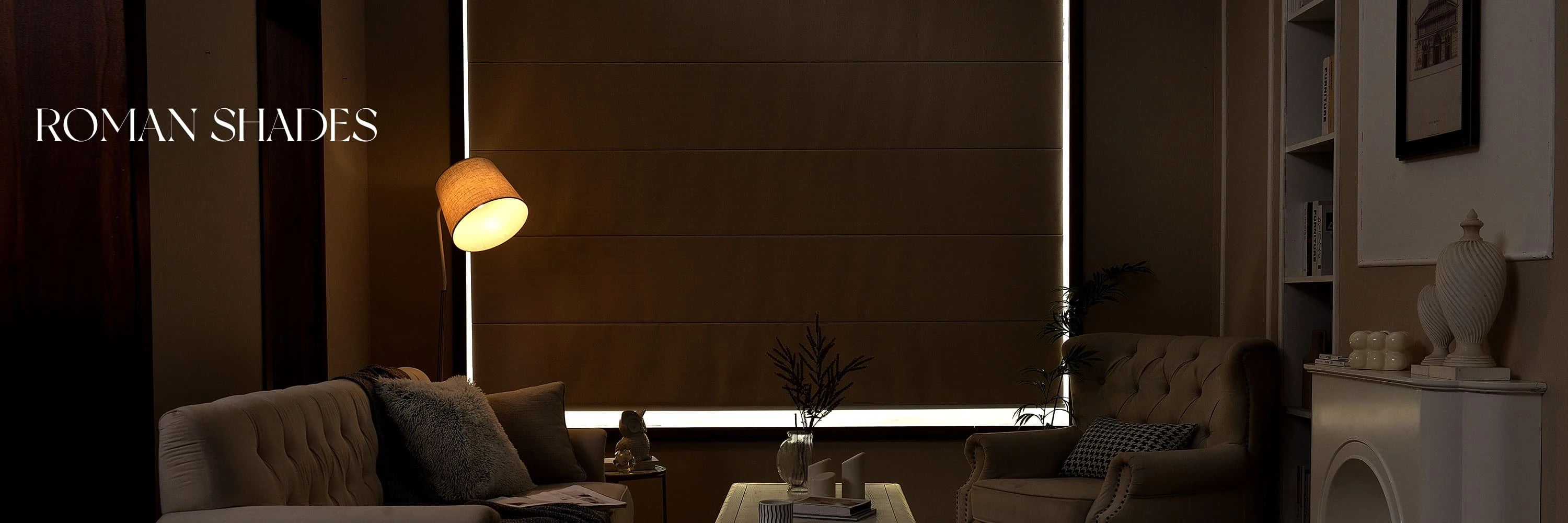 Living room with Roman shades partially drawn, creating a warm ambiance.