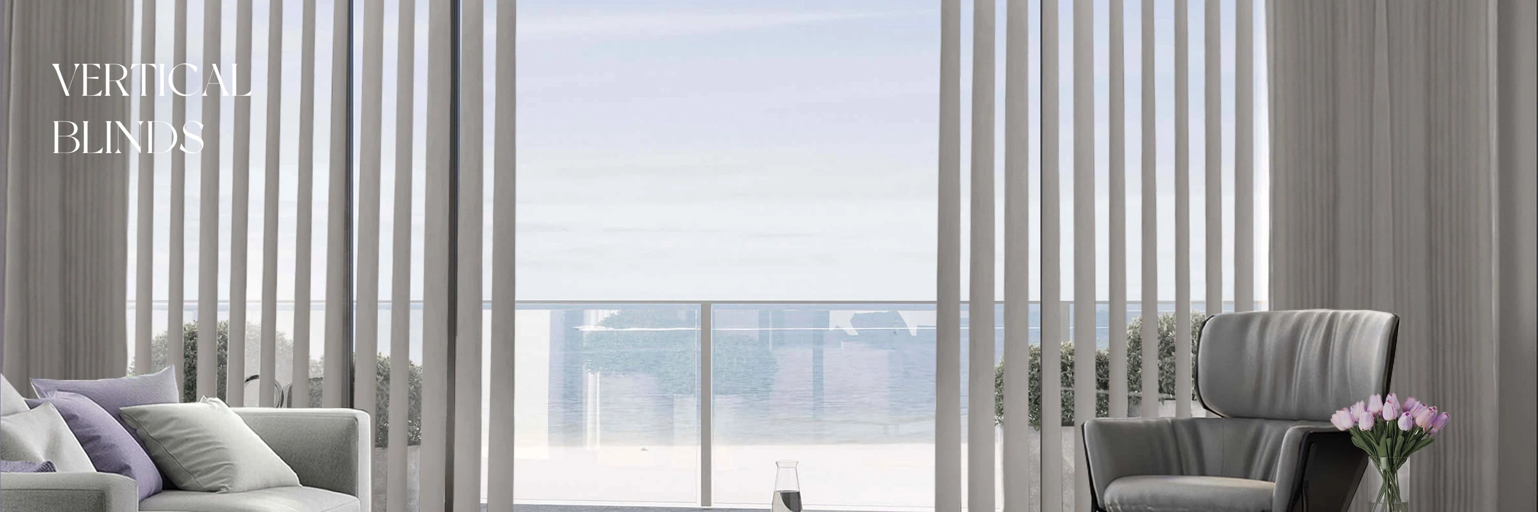 Living room with vertical blinds covering a large window, featuring a sofa and chair.