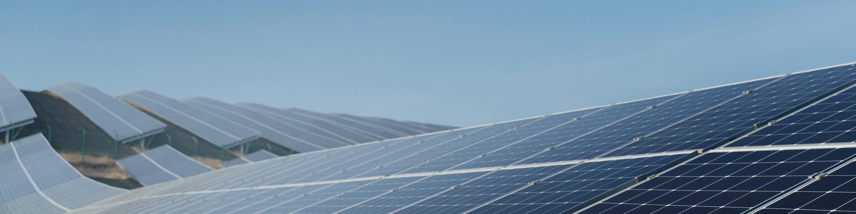 Solar panels on a clear day with blue sky