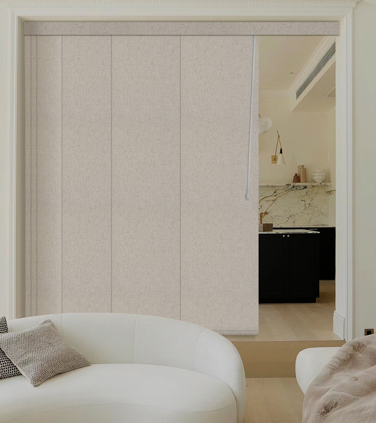 Modern interior with a white sofa and textured wall panels track blinds.