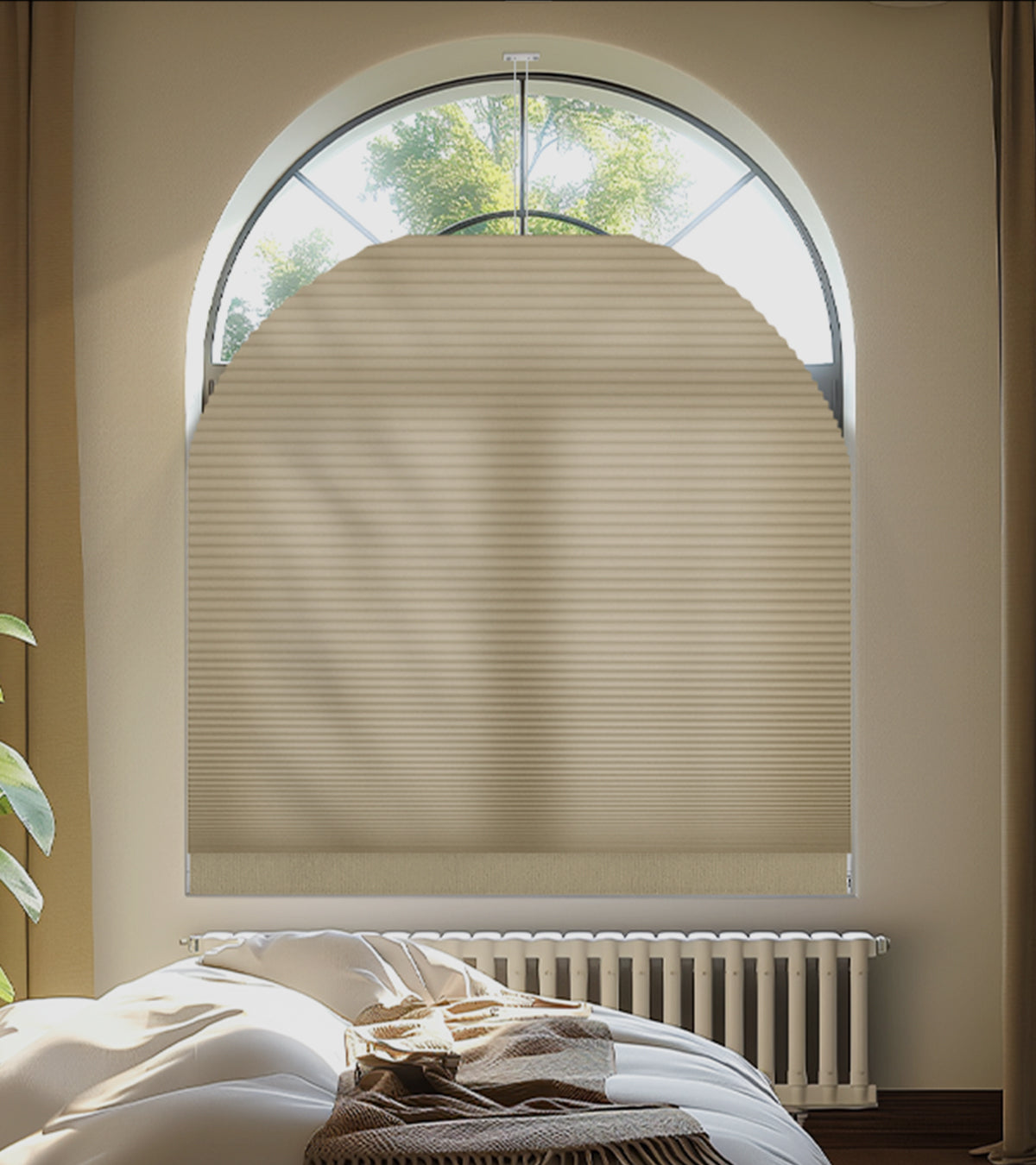 Beige pleated blind covering a large arched window in a bedroom.