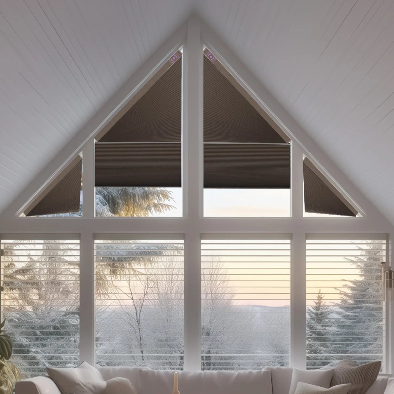 A large shaped window with an arch and angled cellular shades.
