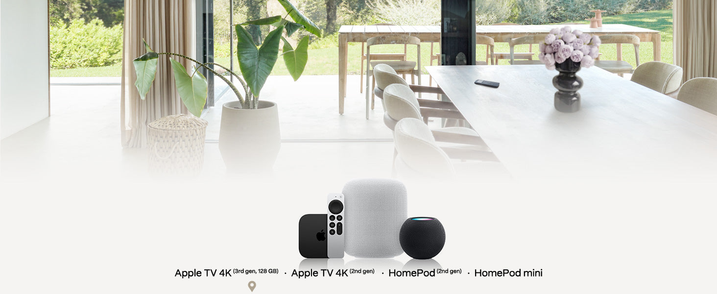 White HomePod mini device on a white surface with Apple TV 4K and HomePod in the background.