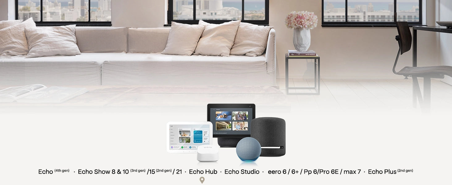 Smart alexa devices on a coffee table with a modern living room in the background