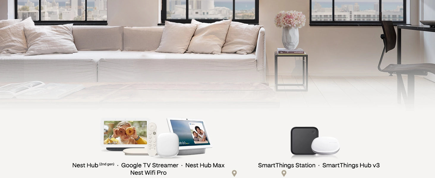 Smart home devices on a coffee table with a modern living room in the background