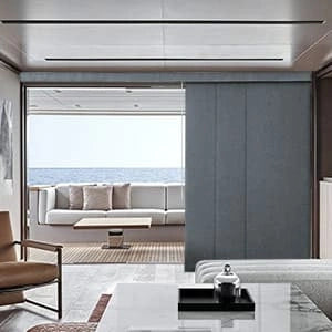 A sliding door with Panel Track Blinds.