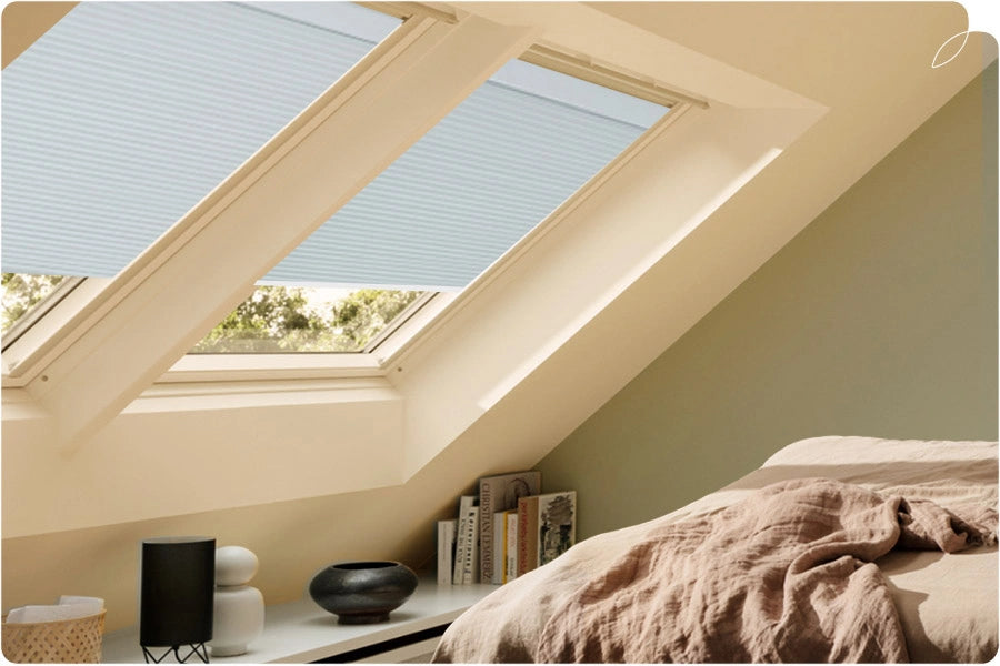 Bedroom with skylight cellular shades