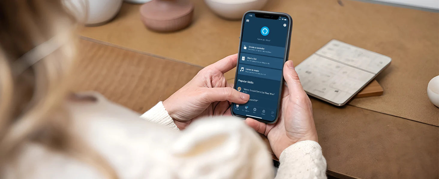 Person using a smartphone app to control no drill roller shades.