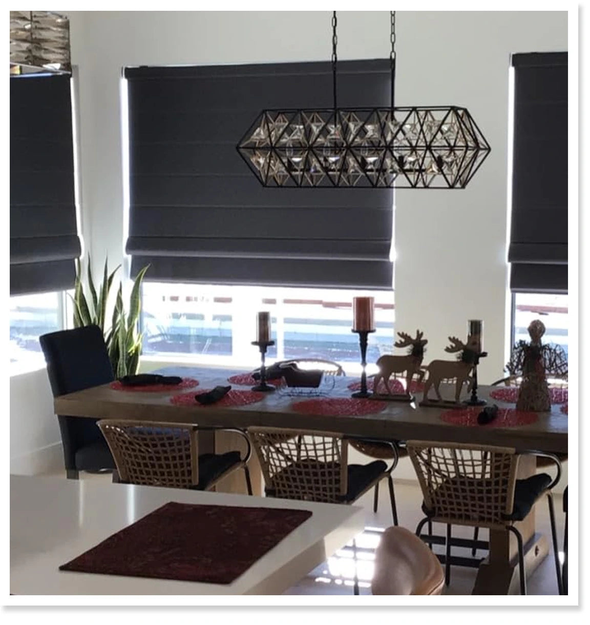 Modern dining room with blackout roman shades