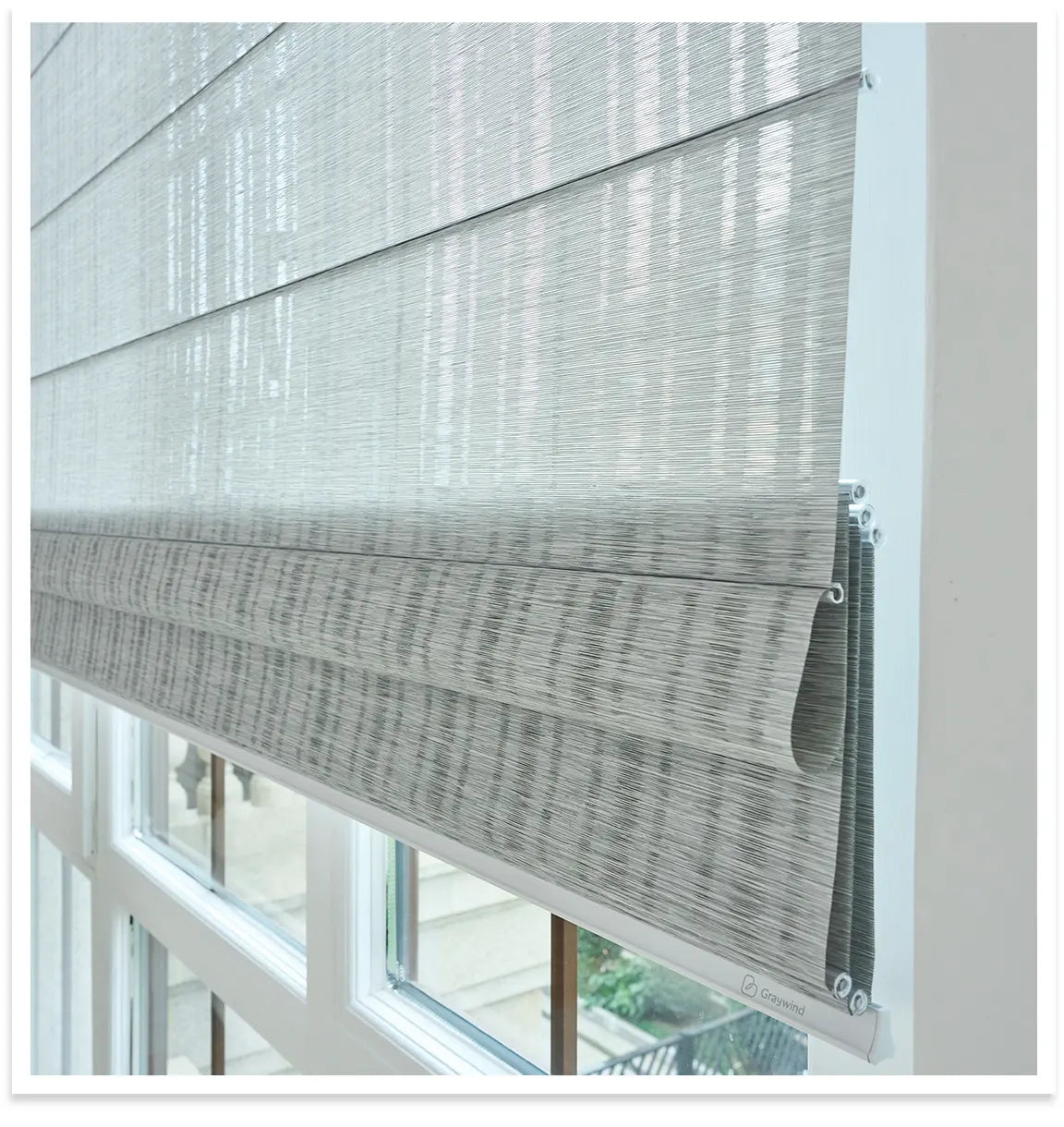 Nautre roman shades in a window setting