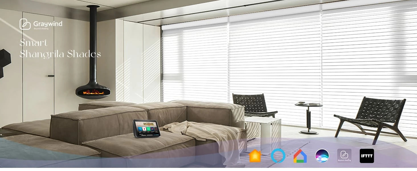 Modern living room with smart shangrila shades and a smart devices.