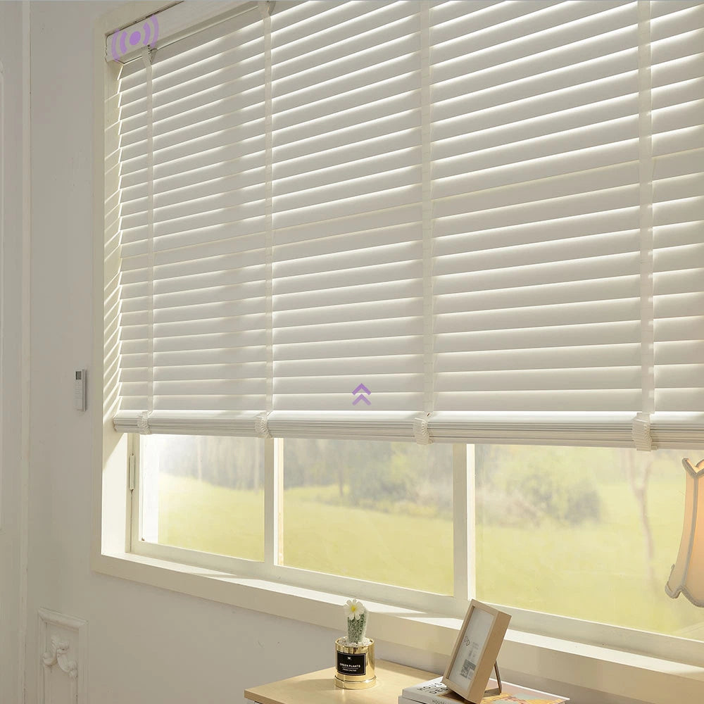 Window with real wood blinds partially open, showing a view of greenery outside.